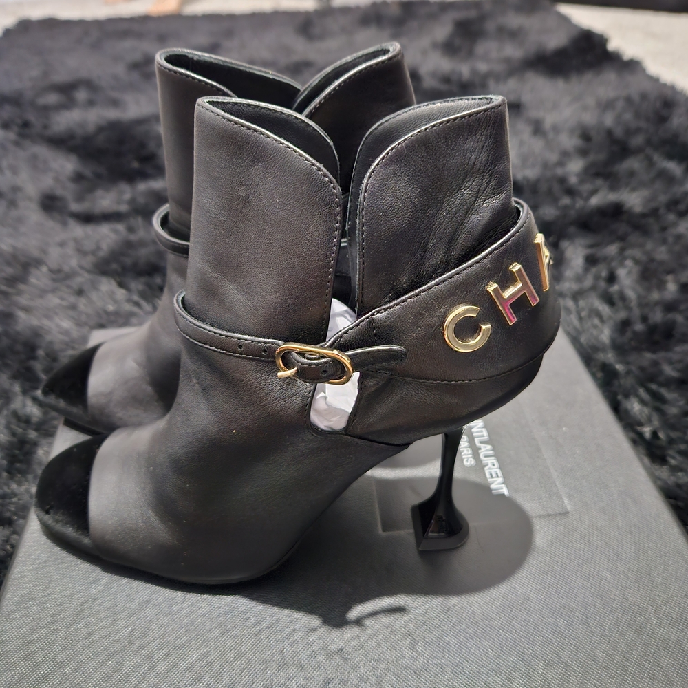 CHANEL Black Ankle Boots with Gold Accents - Picture 4 of 7